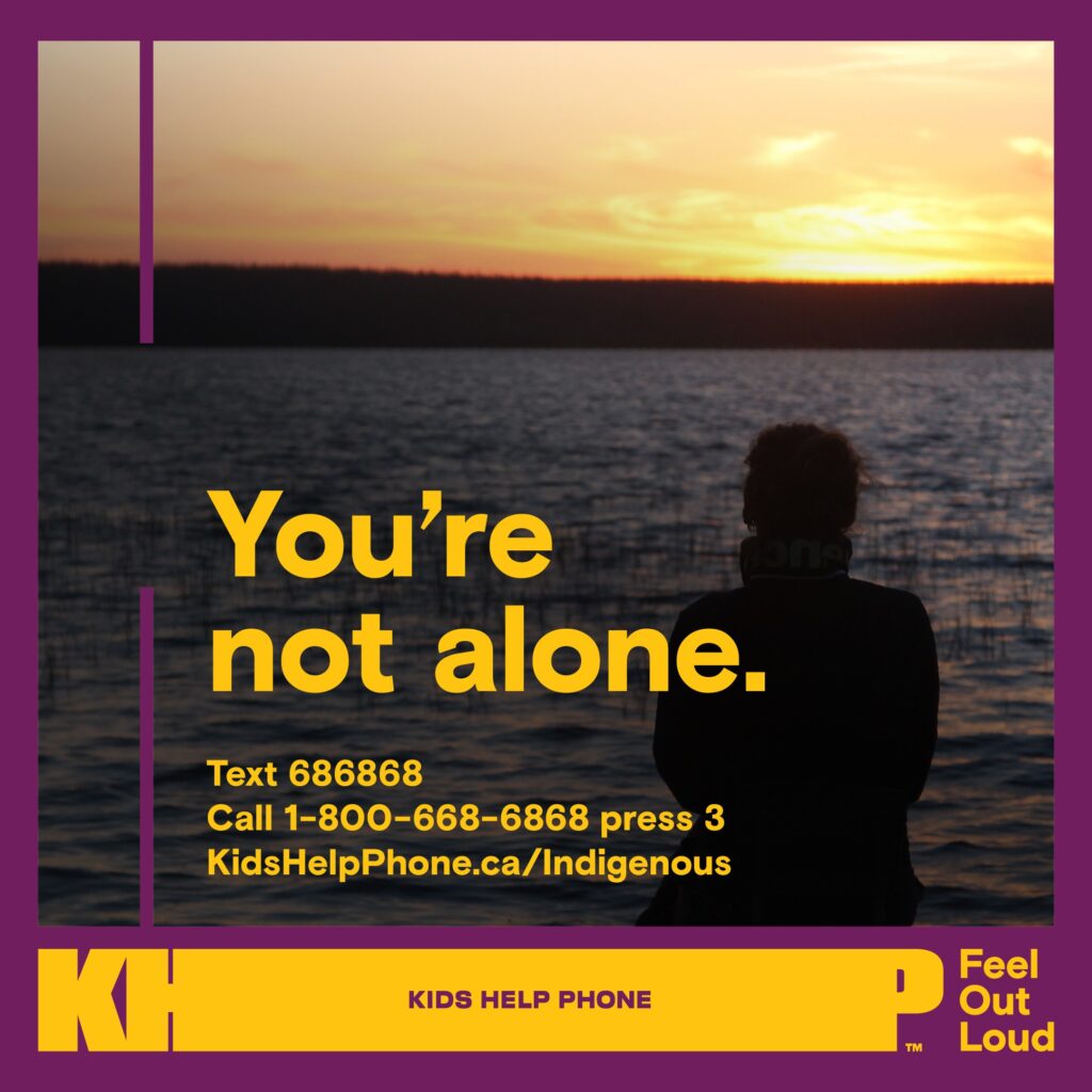 Kids Help Phone social card with contact info titled "You're not alone." Image of a person looking out to a body of water with a sunset.
